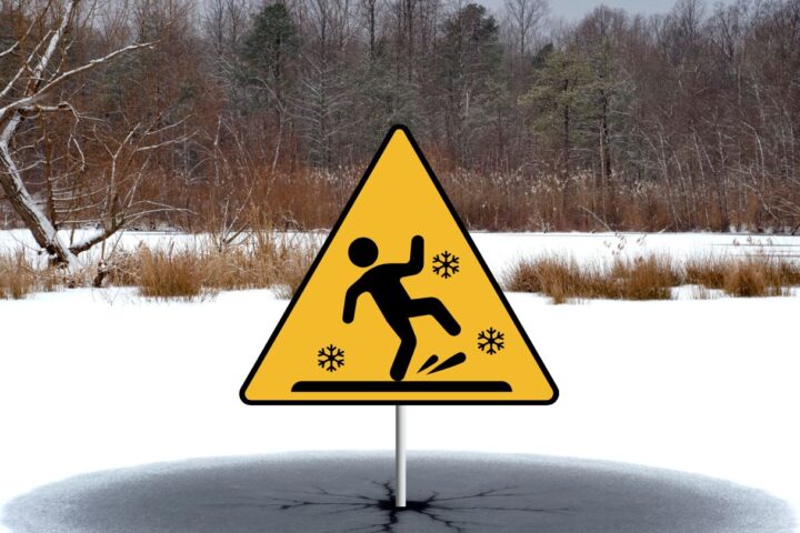 Graphic depicting a triangular yellow warning sign sticking out of a frozen pond, indicating dangerous conditions.