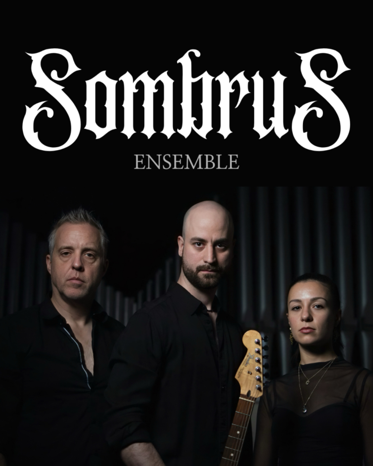 Band promotional image with the text “SombruS Ensemble” above three musicians dressed in dark clothing, one holding an electric guitar, against a dark background.